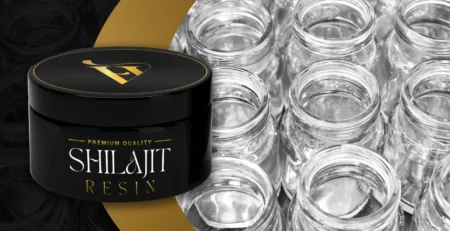 Premium quality Shilajit resin jar next to Miron glass containers, highlighting superior packaging for potency and freshness.